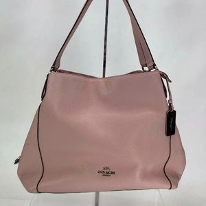 Pink pebbled coach